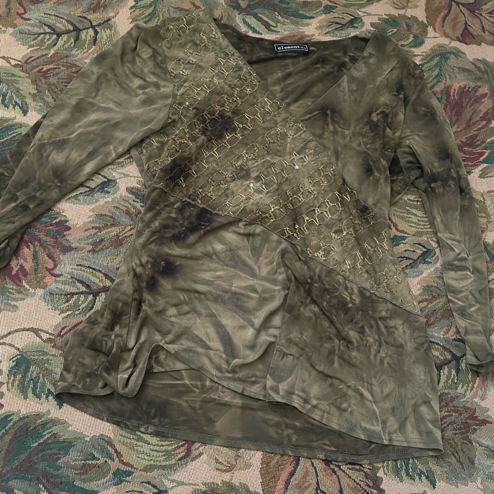 green embroidered top